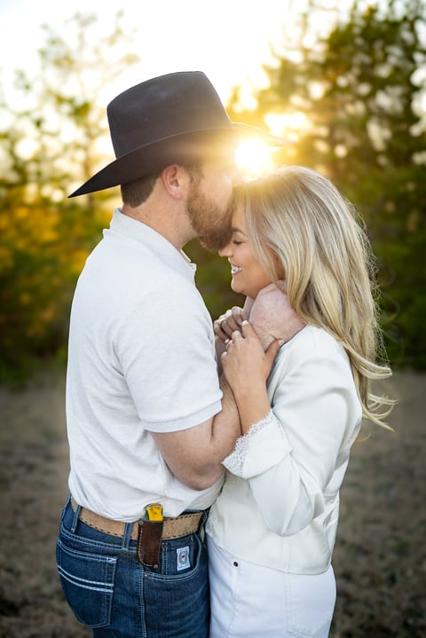 Couple embracing at golden hour